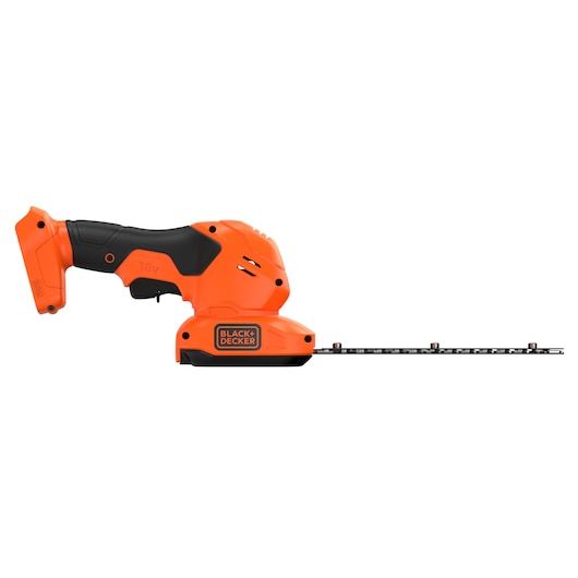 A BLACK+DECKER cordless orange and black handheld shrub and grass shear with an 18V battery compartment, shown from the side.