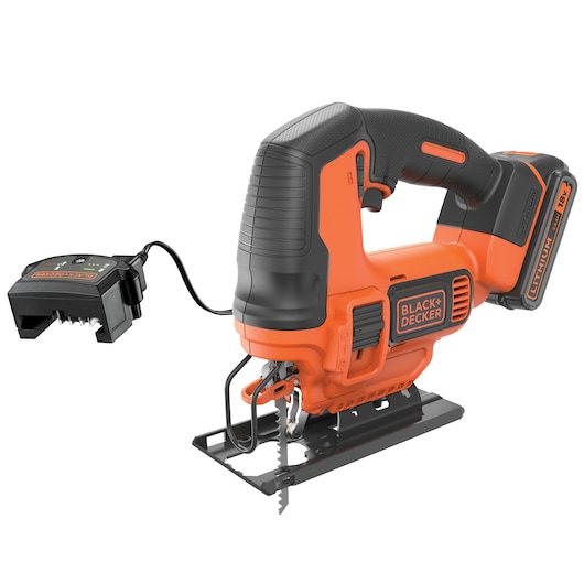 A BLACK+DECKER cordless jigsaw with an 18V lithium battery and charger. The tool is orange and black, featuring a comfortable handle and a visible jigsaw blade at the base.